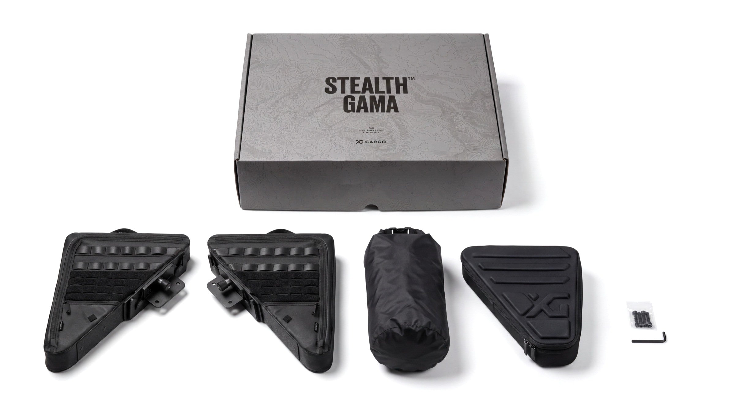 Stealth Gama box contents: bags, Roll Top Dry Bag, Mini Travel Case, and mounting hardware