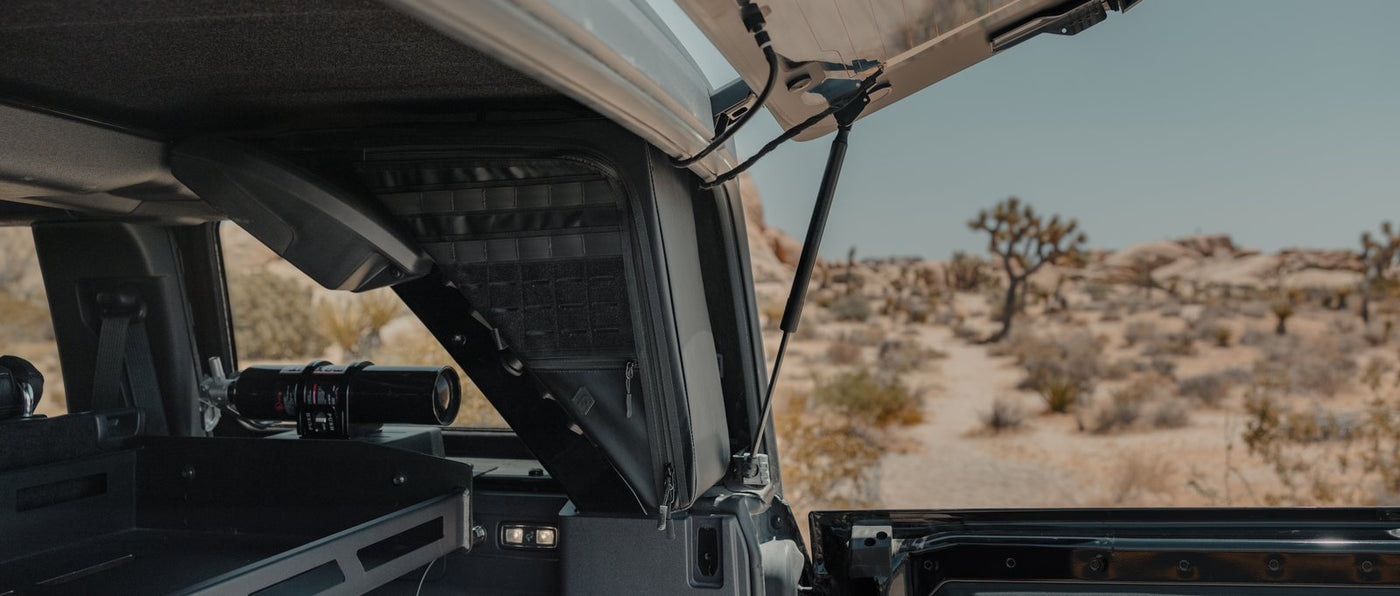 Open tailgate with MOLLE panel